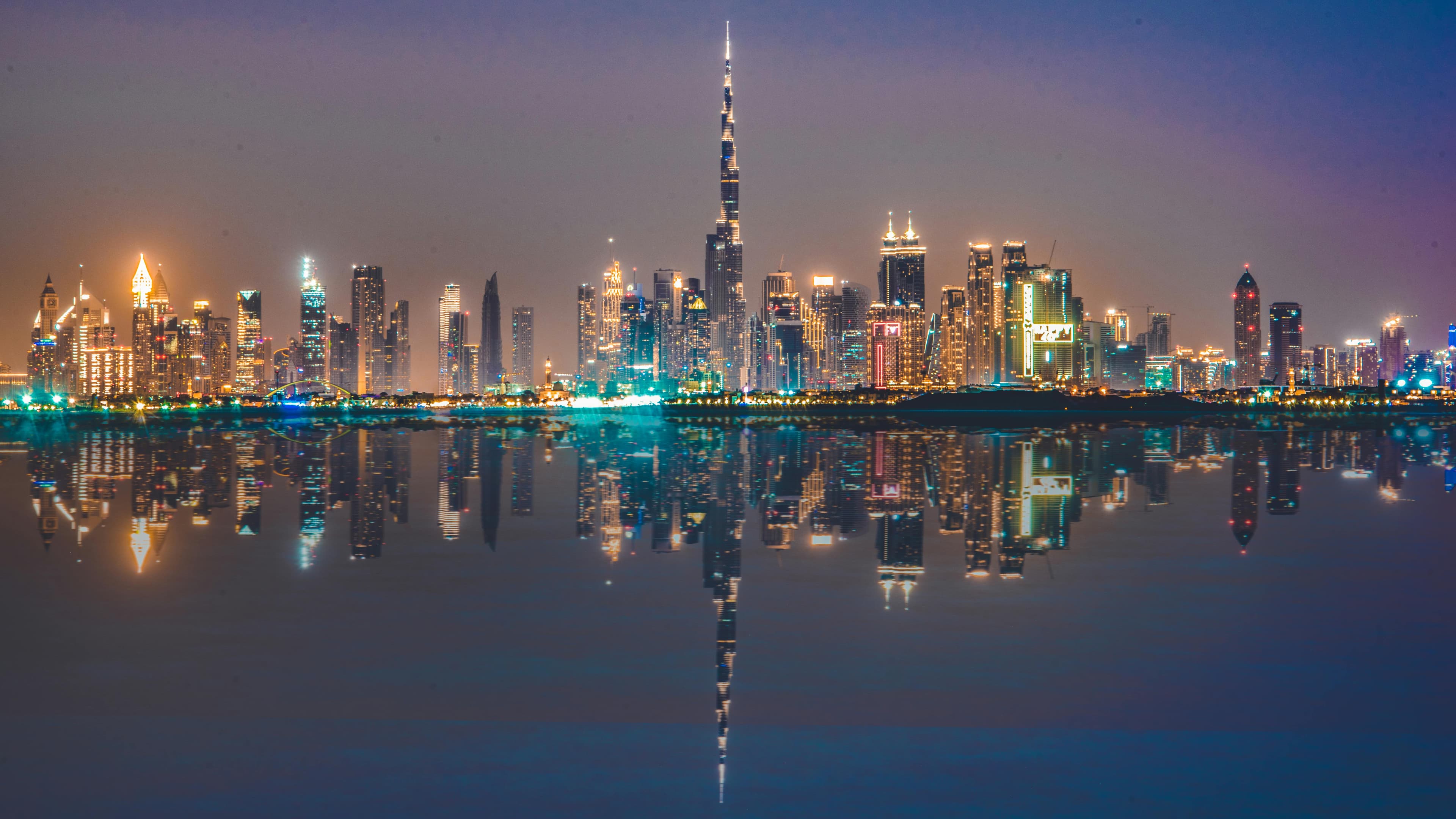 Gaze upon the Burj Khalifa, Dubai's architectural marvel, standing tall as the world's tallest building and a symbol of the city's modern elegance and ambition. Its soaring presence dominates the skyline, offering unparalleled views and capturing the essence of Dubai's innovative spirit.