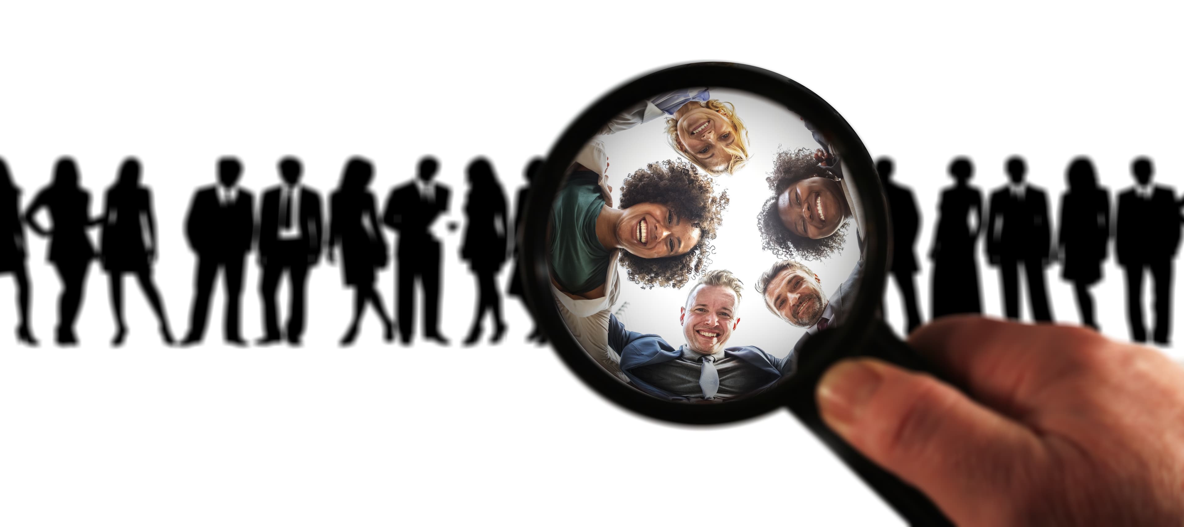 people in a circle looking down shown through magnifying glass