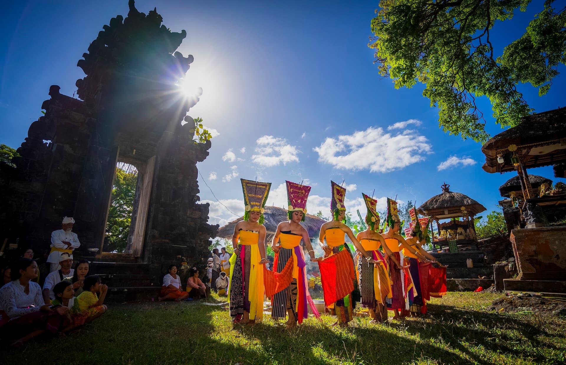 The island's unique culture is reflected in its traditional ceremonies, dance, and cuisine, featuring dishes such as Nasi Goreng and Babi Guling.